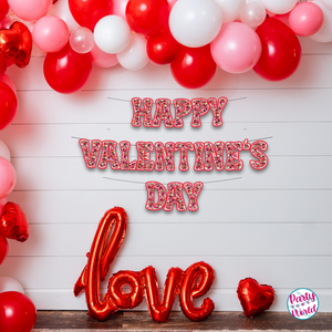 Happy Valentine's Day paper banner with red and gold faux glitter letters, spreading love and joy.