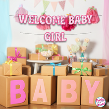 Load image into Gallery viewer, Welcome baby girl banner with pink and purple conversation heart pattern letters, adorned with hearts. A joyful celebration of a new arrival.