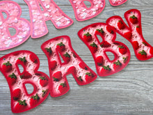 Load image into Gallery viewer, Welcome baby girl banner with strawberries and hearts, perfect for celebrating the arrival of a precious little one.