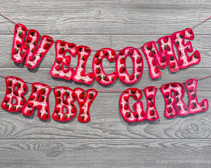 Welcome baby girl banner with strawberries and hearts, perfect for celebrating the arrival of a precious little one.